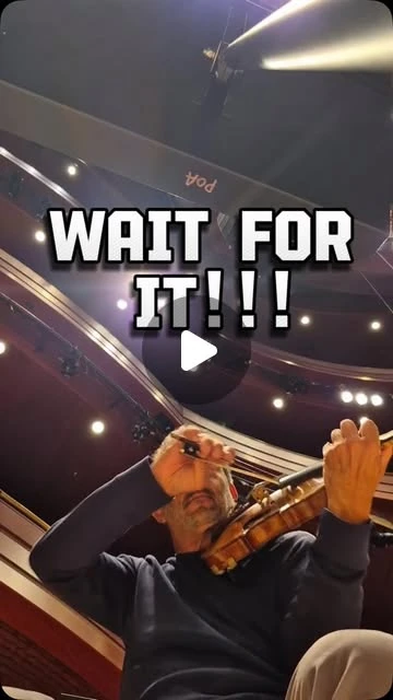 Richard performing violin beneath the words Wait for it